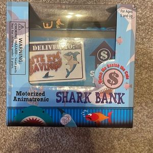 Shark piggy bank. Good for young kids. Asking $12 OBO